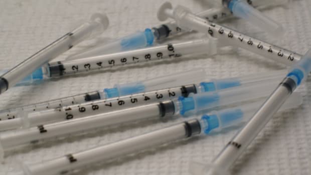 Photo showing a small pile of syringes