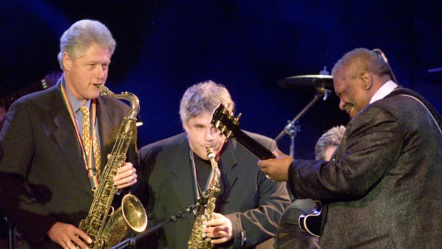 President Bill Clinton plays the sax with B.B. King and Dave Boruff at the Regent Beverly Wilshire Hotel in Beverly Hills, California, on April 1st, 2001.