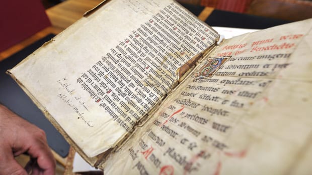 An extract from the Gutenberg Bible discovered in a library by an assistant who was searching the collection for something else. Experts confirmed the discovery by comparing the extract with a photocopy of the Gutenberg Bible, which was written with the same gothic font and printed by Johannes Gutenberg in Germany in the 15th century.