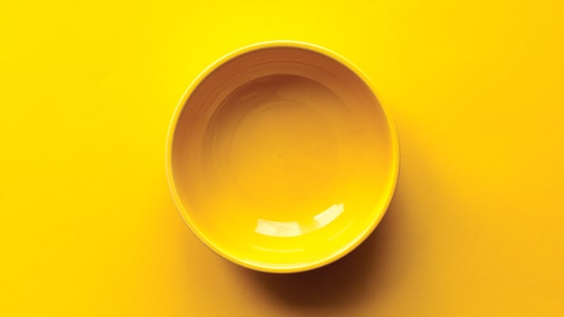 An empty yellow bowl.