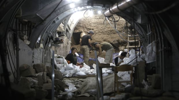 Israel Antiquities Authority and Nature and Parks Authority workers dig in an underground tunnel on May 25th, 2017, unveiling evidence from 2,000 years ago of the battle of Jerusalem following the destruction of the Second Temple.