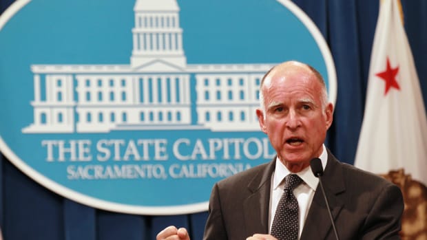California Governor Jerry Brown speaks to reporters at the California State Capitol.