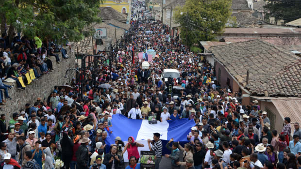 People attend the funeral of murdered indigenous activist Berta Caceres on March 5th, 2016.
