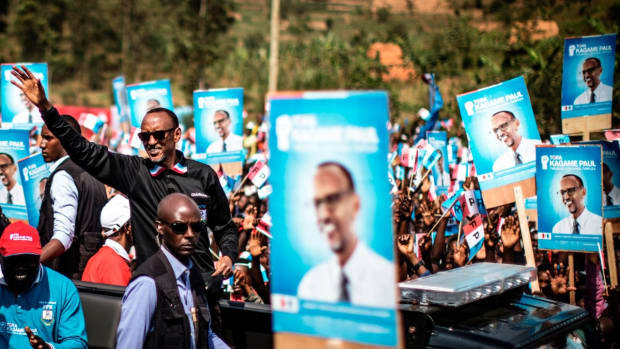 Incumbent Rwandan President Paul Kagame (L) greets a crowd of supporters as he arrives for a campaign rally on July 31st, 2017, in Gakenke ahead of the August 4th presidential election. Kagame and his Rwanda Patriotic Front Party have held an iron grip on power since overthrowing the extremist Hutu regime, which perpetrated the 1994 genocide of 800,000 Tutsis.