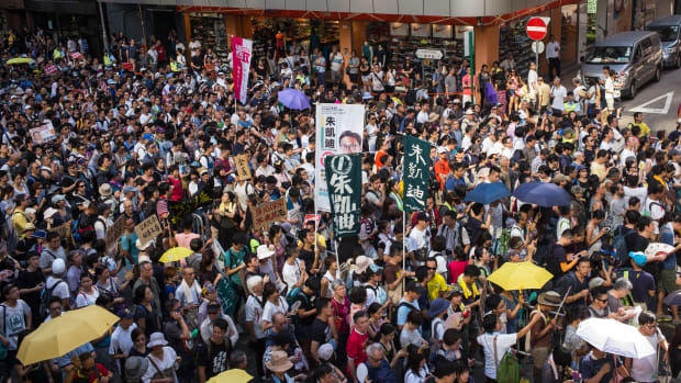 Protesters attend a rally to support jailed activists Joshua Wong, Nathan Law, and Alex Chow on August 20th, 2017, in Hong Kong, China.