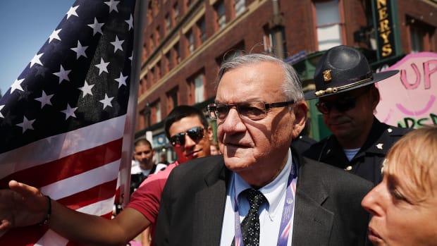 Maricopa County Sheriff Joe Arpaio is surrounded by protesters and members of the media at the site of the Republican National Convention on July 19th, 2016, in Cleveland, Ohio.