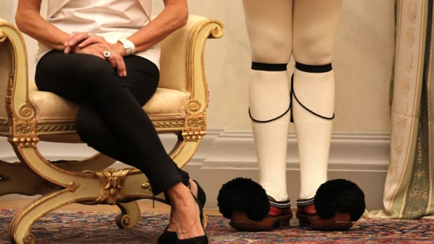 The shoes of French president's wife Brigitte Macron (left) are pictured next to the Greek guard's shoes during a welcoming ceremony at the presidential palace in Athens, on September 7th, 2017, as part of a two-day official visit of the French president to Greece.