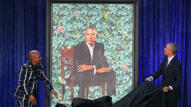 Former U.S. President Barack Obama and artist Kehinde Wiley unveil Obama's portrait during a ceremony at the Smithsonian's National Portrait Gallery on February 12th, 2018, in Washington, D.C.