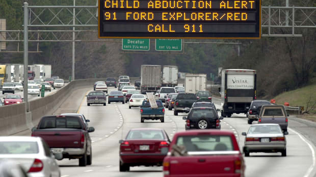 A Georgia Department of Transportation sign alerts drivers to look for the vehicle of quadruple murder and kidnapping suspect Jerry William Jones on January 8th, 2003, in Atlanta, Georgia.