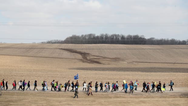 Students march the last leg of a 50-mile journey into the hometown of House Speaker Paul Ryan (R-WI) to call attention to gun violence on March 28th, 2018, in Janesville, Wisconsin. About 40 students from around Wisconsin organized the march, dubbed 50 Miles More, to keep alive the spirit and dialog of the recent March for Our Lives events.