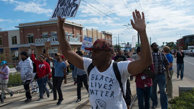 Black Lives Matter protesters demonstrate against police brutality in St. Paul, Minnesota.