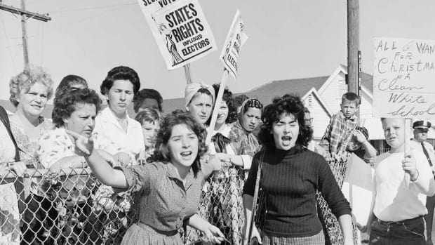 Women protest against integration outside William Franz Elementary School in Louisiana in 1960.