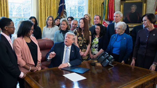 President Donald Trump signing FOSTA at the White House