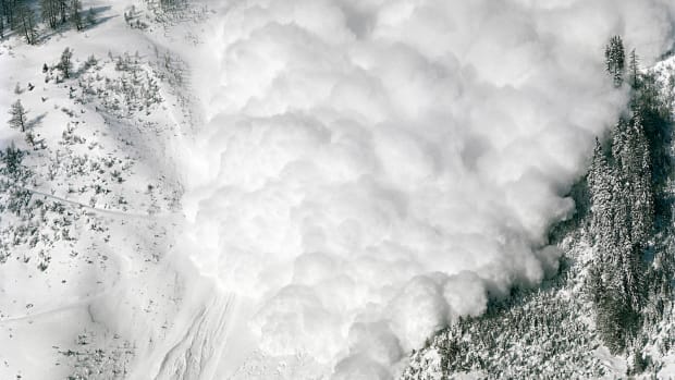 Arbaz, Switzerland: A controlled avalanche, started with dynamite, slides down a mountain in the Swiss canton of Valais.