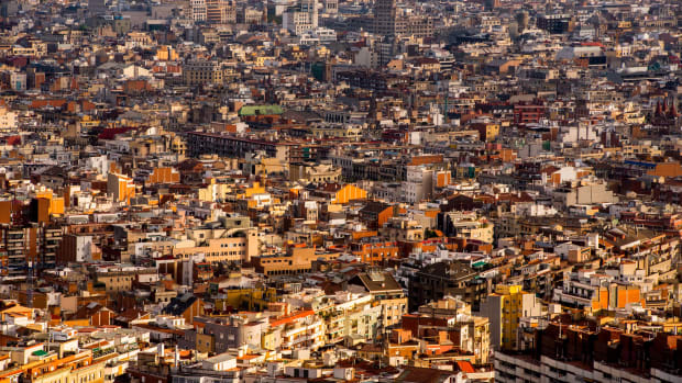 Residential buildings stand on the city skyline in Barcelona, Spain.