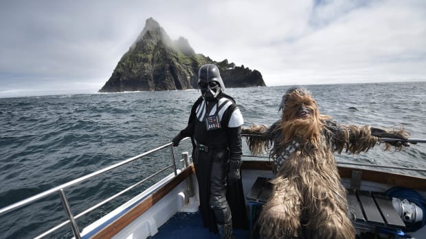 Fans dressed as Darth Vader and Chewbacca take a boat trip to the Skelligs on May 4th, 2018, in Portmagee, Ireland. The first-ever Star Wars festival is taking place against the backdrop of the famous Skellig Michael island, which was used extensively in Episode VII and Episode VIII of the popular science-fiction saga. The small fishing village of Portmagee, which is closest to the location, has seen a boom in tourism following the latest films. The village will host a Star Wars drive-in and a Star Wars-themed Irish dancing competition over the weekend.