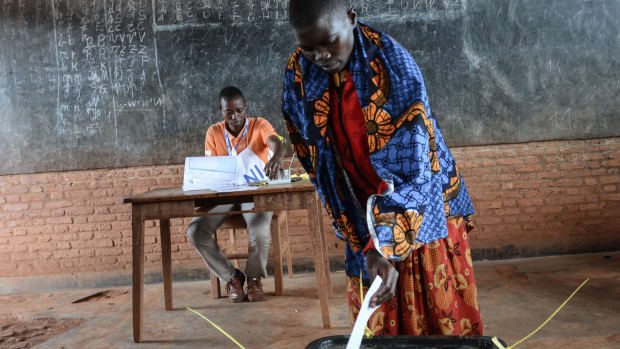A woman casts her vote at a polling station in Ciri, northern Burundi, on May 17th, 2018, during a referendum on constitutional reforms that, if passed, will shore up the power of incumbent president and enable him to rule until 2034. For many critics, the referendum is yet another blow to hopes of lasting peace in the fledgling democracy, which experienced decades of conflict marked by violence between majority Hutu and the minority Tutsi who had long held power.