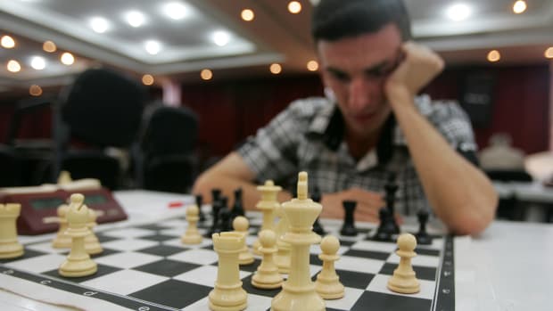 A man plays chess in Baghdad, Iraq.
