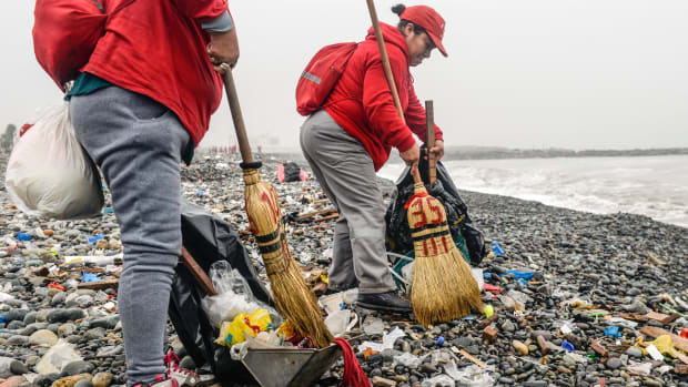 Groups of volunteers clean up plastic waste on a beach in Lima, Peru, during World Environment Day on June 5th, 2018. The United Nations urged people to take steps against the use of plastic bags, as part of a global challenge to reduce the increasing pollution of the oceans.