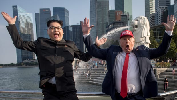 Kim Jong-un impersonator Howard X and Donald Trump impersonator Dennis Alan pose for photographers during a visit to the famous Merlion Park on June 8th, 2018 in Singapore. The historic meeting between President Donald Trump and North Korean leader Kim Jong-un has been scheduled in Singapore for June 12th as a small circle of experts have already been involved in talks toward the landmark summit in the city-state.