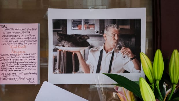 Notes, photographs, and flowers are left in memory of Anthony Bourdain at the closed location of Brasserie Les Halles, where Bourdain used to work as the executive chef, on June 8th, 2018, in New York City.