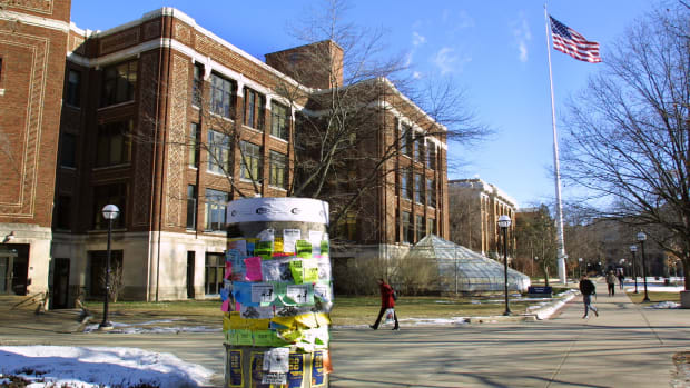 Students walk across the University of Michigan campus in Ann Arbor, Michigan.