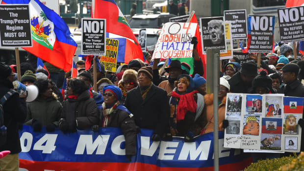 Protesters with the 1804 Movement for All Immigrants march with the Haitian community and other immigrant forces across the Brooklyn Bridge.