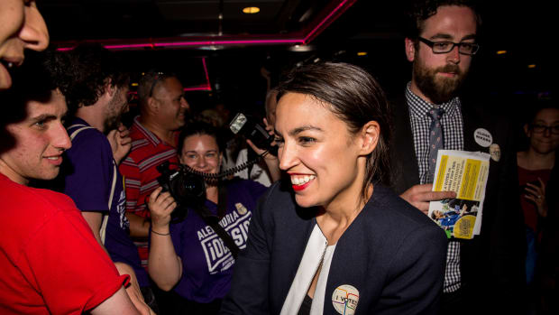 Alexandria Ocasio-Cortez celebrates with supporters at a victory party after upsetting incumbent Democratic Representative Joseph Crowley on June 26th, 2018, in New York City.