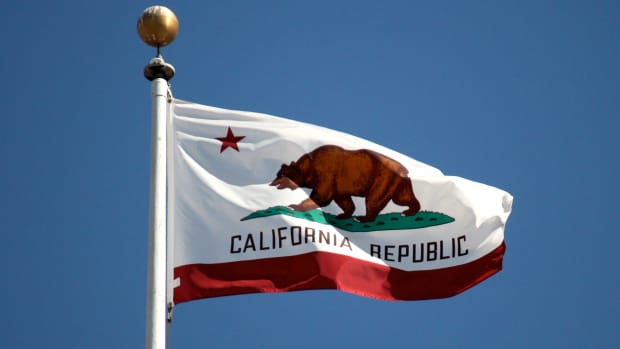 The California state flag flying at San Francisco City Hall.