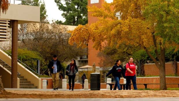 Students walk through campus at California State University–Fresno.