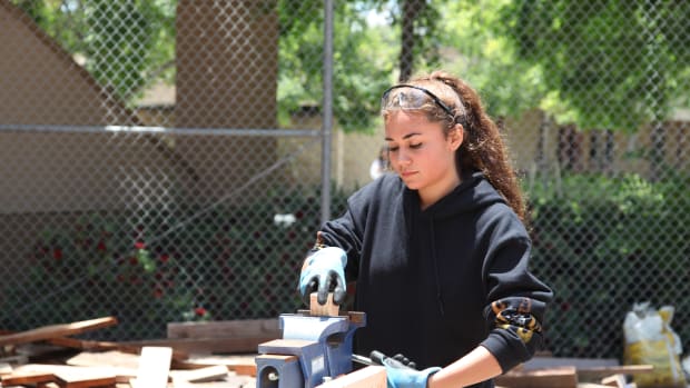 Alana Johnson, 18, uses a workbench vise during a construction class at Abraxas Continuation High School, in Poway, California.