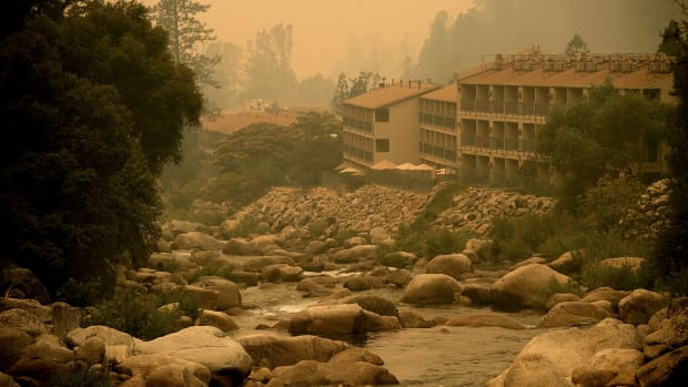 Smoke from the Ferguson Fire hangs over the Yosemite View Lodge in El Portal, Yosemite National Park, California, on July 21st, 2018.