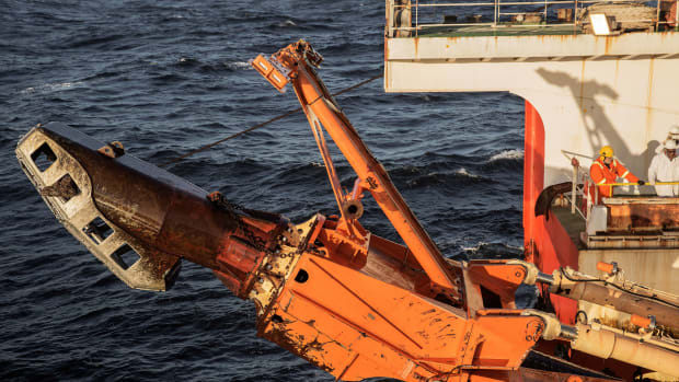A giant crawler machine used to dredge the seabed for diamonds is seen being pulled on board the Diamonds Sea Mining vessel MAFUTA from Debmarine, a joint venture between Diamonds Mining Giant De Beers and the Namibian government.