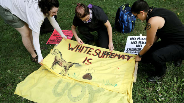 Antifascist demonstrators prepare signs for their counter-protest to the Unite the Right rally in Washington, D.C., on August 12th, 2018.