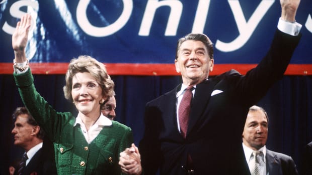 Ronald and Nancy Reagan wave to supporters at a campaign rally in 1984.