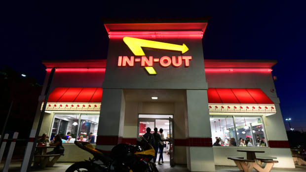 People enter an In-N-Out Burger restaurant in Alhambra, California, on August 30th, 2018.