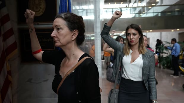 In protest against Supreme Court nominee Judge Brett Kavanaugh, activists chant slogans outside the office of Senate Judiciary Committee Chairman Senator Chuck Grassley (R-Iowa) on September 20th, 2018, at Hart Senate Office Building on Capitol Hill in Washington, D.C.