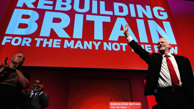 Labour Party leader Jeremy Corbyn acknowledges delegates following his keynote on day four of the Labour Party conference at the Arena and Convention Centre on September 26th, 2018, in Liverpool, England. After months of controversy and allegations of anti-Semitism against Corbyn and the party, he focused on winning issues like green jobs and free childcare in the closing speech.