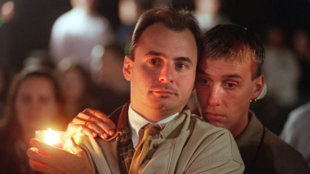 Two men embrace each other at a vigil for Matthew Shepard at the Capitol in Washington, D.C., on October 14th, 1998, two days after he died. Thousands converged outside the Capitol to call for political action to help stop hate crimes and to draw attention to victims of anti-gay violence.