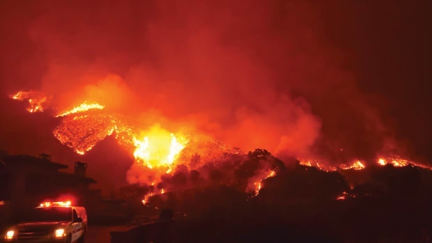 Santa Barbara County Fire Department's Mike Eliason captured flames above a Montecito neighborhood on Bella Vista Drive on December 12th, 2017.