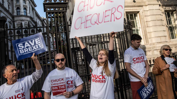 Pro-Brexit demonstrators gather outside Downing Street calling for a hard-line withdrawal from the European Union during the weekly Cabinet Meeting at Downing Street on October 16, 2018 in London, England. "Chuck Chequers" refers to the so-called Chequers plan worked out in July.