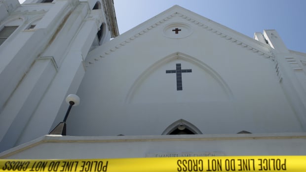 Police tape outside the Emanuel AME Church the morning after a mass shooting at the Emanuel AME Church in Charleston, South Carolina, on June 18th, 2015.