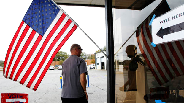 A voter heads to a polling station in Athens, Georgia, on November 8th, 2016. In the past decade, the number of registered voters removed from the rolls across the South due to a conviction has nearly doubled.