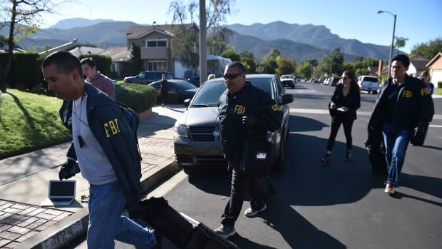 Federal Bureau of Investigation staff arrive at the home of suspected nightclub shooter Ian David Long on November 8th, 2018, in Thousand Oaks, California.