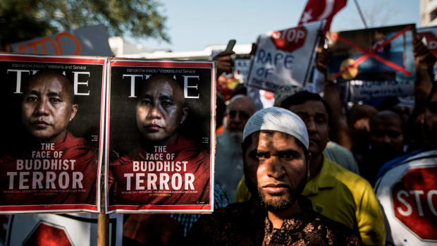 Protesters gather outside the Embassy of Myanmar in Pretoria on September 15th, 2017, during a demonstration against Naypyidaw's alleged "ethnic cleansing" of its Rohingya minority. The march by hundreds of demonstrators outside Myanmar's embassy turned violent on September 15th, an AFP journalist reported, and police outside the mission in Pretoria fired teargas and stun grenades to disperse the angry crowd.