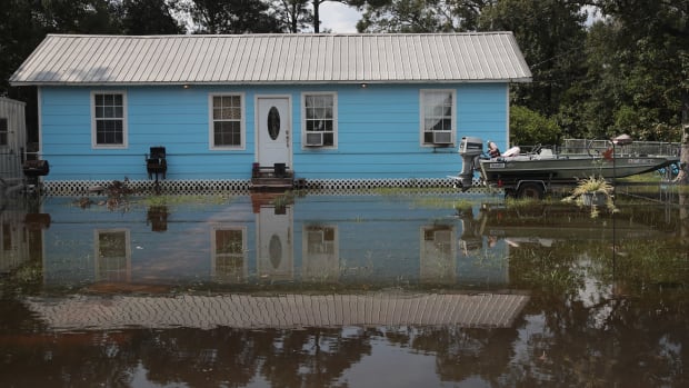 Floodwater surrounds a home after torrential rains pounded Southeast Texas following Hurricane and Tropical Storm Harvey causing widespread flooding on September 3rd, 2017, in Orange, Texas. Harvey, which made landfall north of Corpus Christi August 25th, has dumped nearly 50 inches of rain in and around Houston.