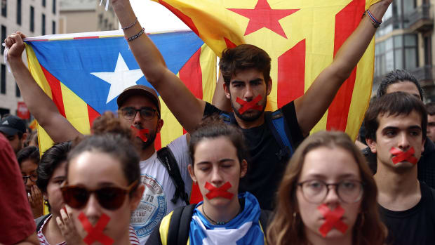 Students hold a silent protest against the violence that marred Catalonia's referendum vote on October 2nd, 2017, in Barcelona, Spain.