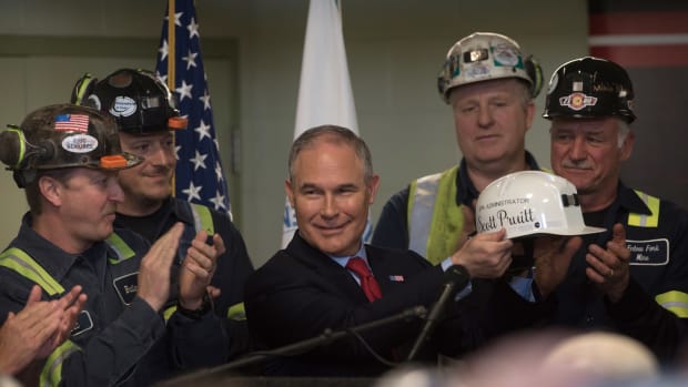 U.S. Environmental Protection Agency Administrator Scott Pruitt holds up a miner's helmet that he was given after speaking with coal miners at the Harvey Mine on April 13th, 2017, in Sycamore, Pennsylvania.