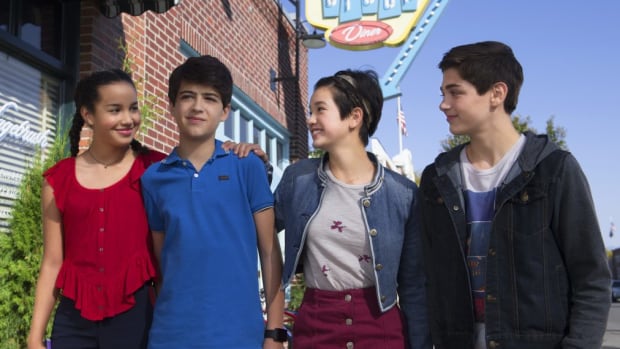 Cyrus (second to the left) will come out on upcoming episodes of Disney Channel's Andi Mack.