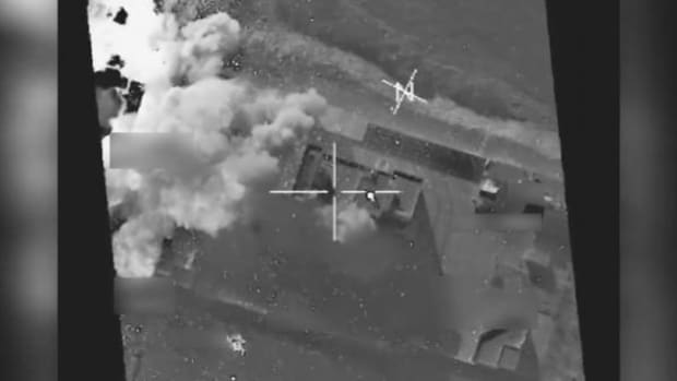 A coalition airstrike destroys a Da'esh weapons cache near Mosul, Iraq.
